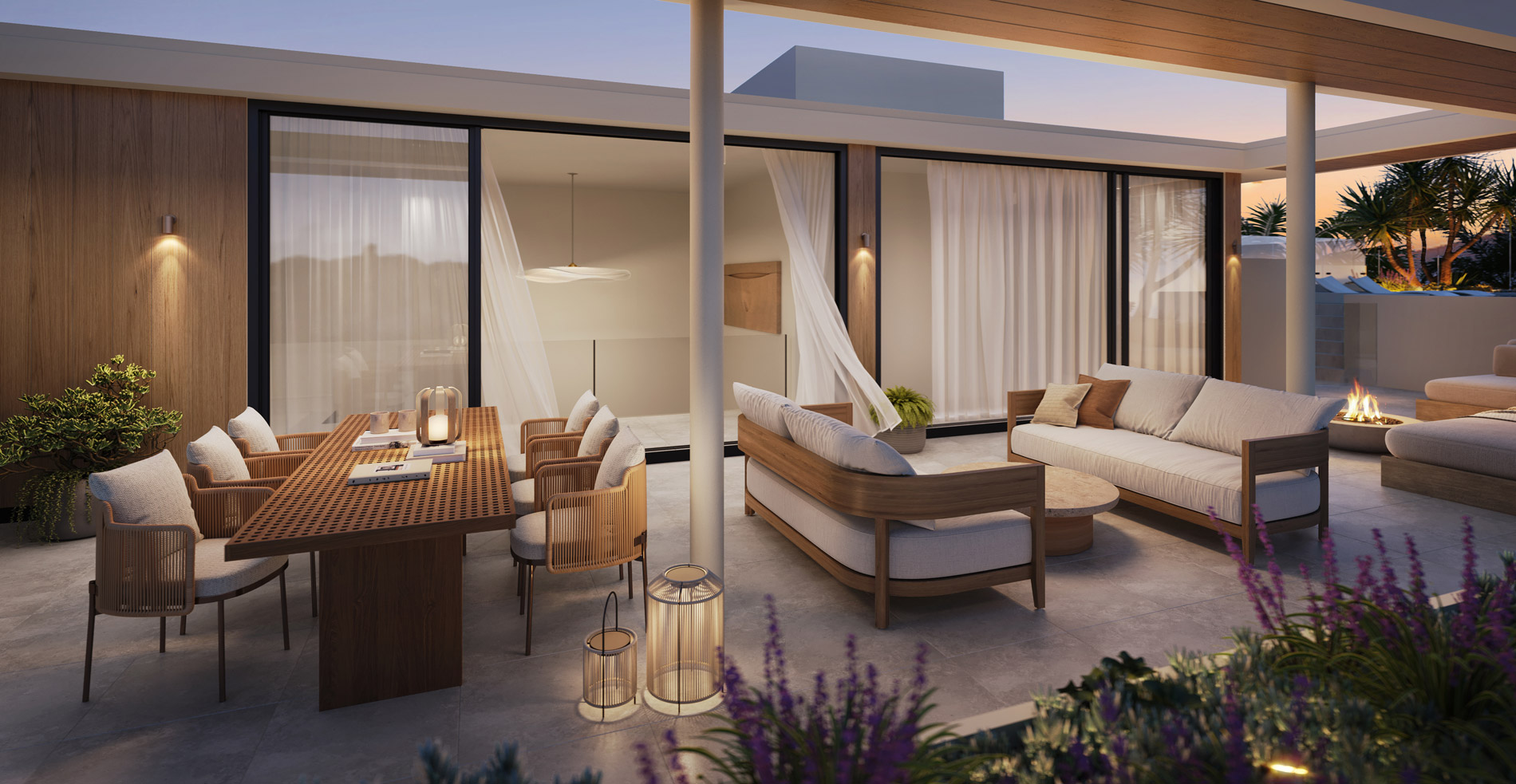Rooftop terrace lounge and fire pit at dusk
